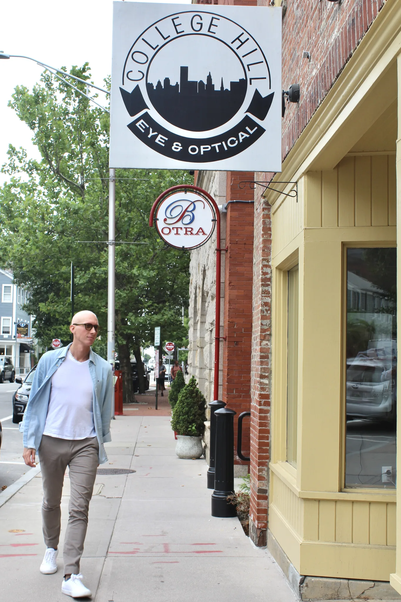 The sidewalk outside College Hill Eye & Optical on S Main Street in Providence, RI.