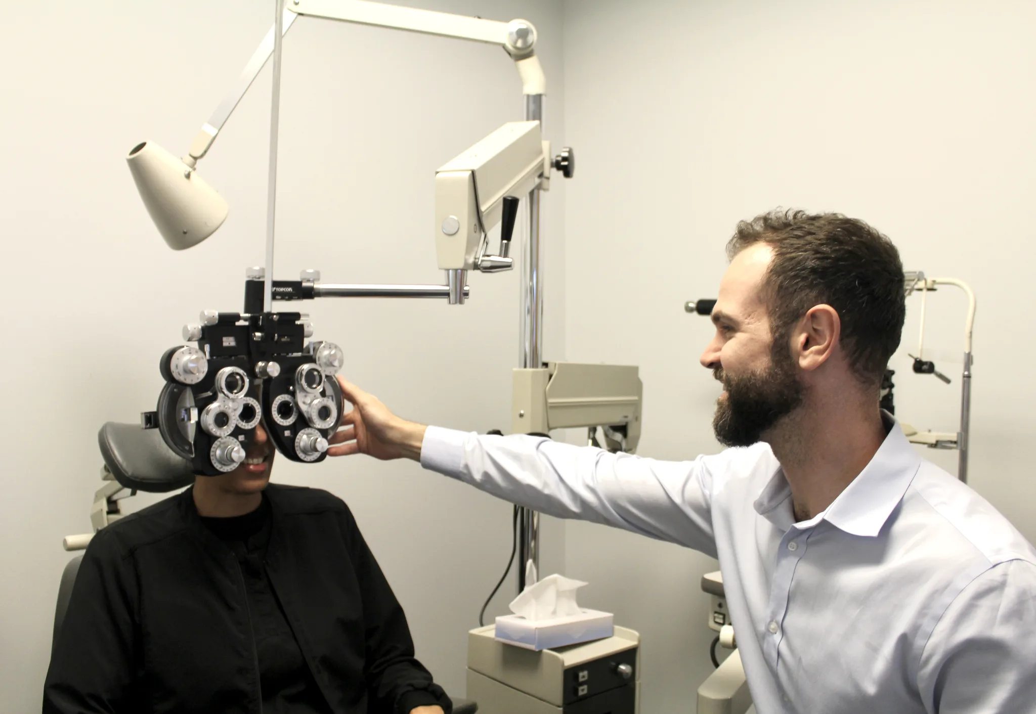 A comprehensive vision exam in progress at College Hill Eye & Optical in Providence, RI.